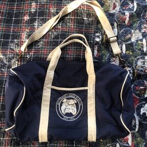 Navy and Beige Duffel Bag with bull dog graphic